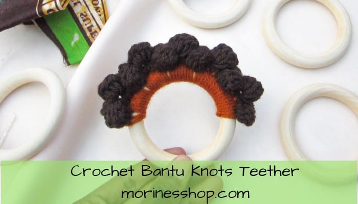 Crochet this adorable Bantu Knots Teether for babies! The crochet pattern is absolutely free & can be easily customized using various colours #CrochetTeether #CrochetTeethiingRing #CrochetForBaby #CrochetBabyGift #CrochetTexture