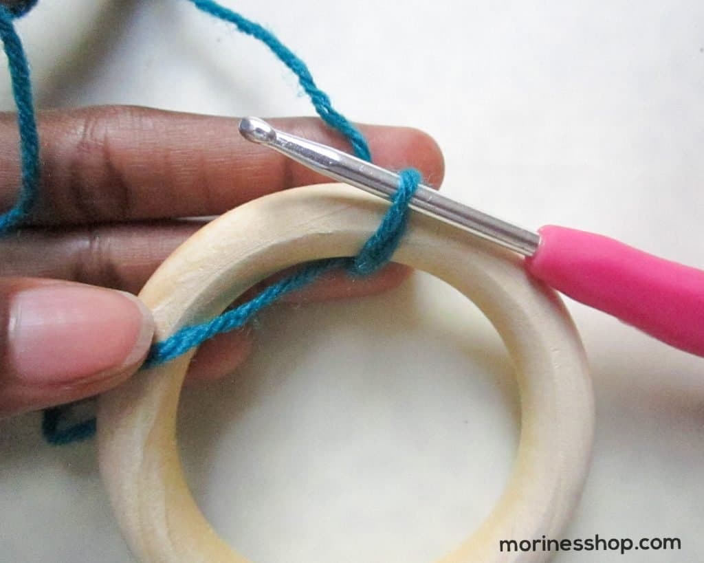 Passing the slip knot through the ring