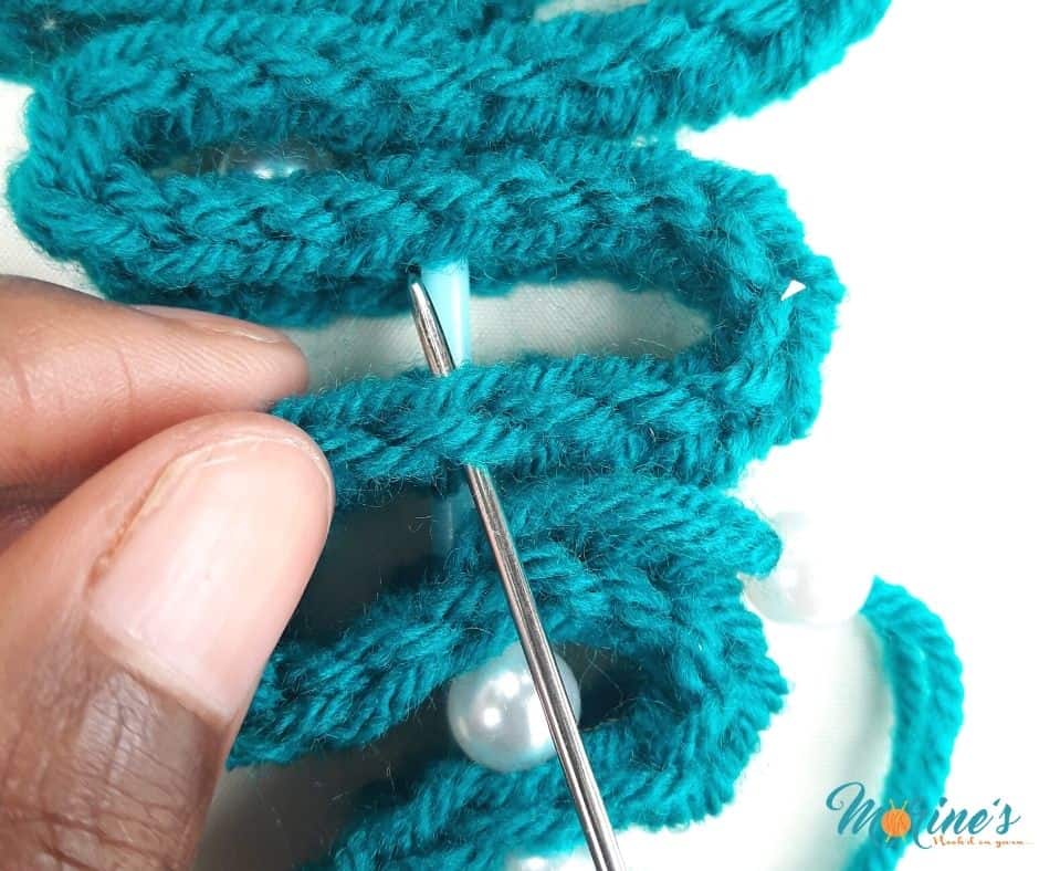 Where to insert your darning needle