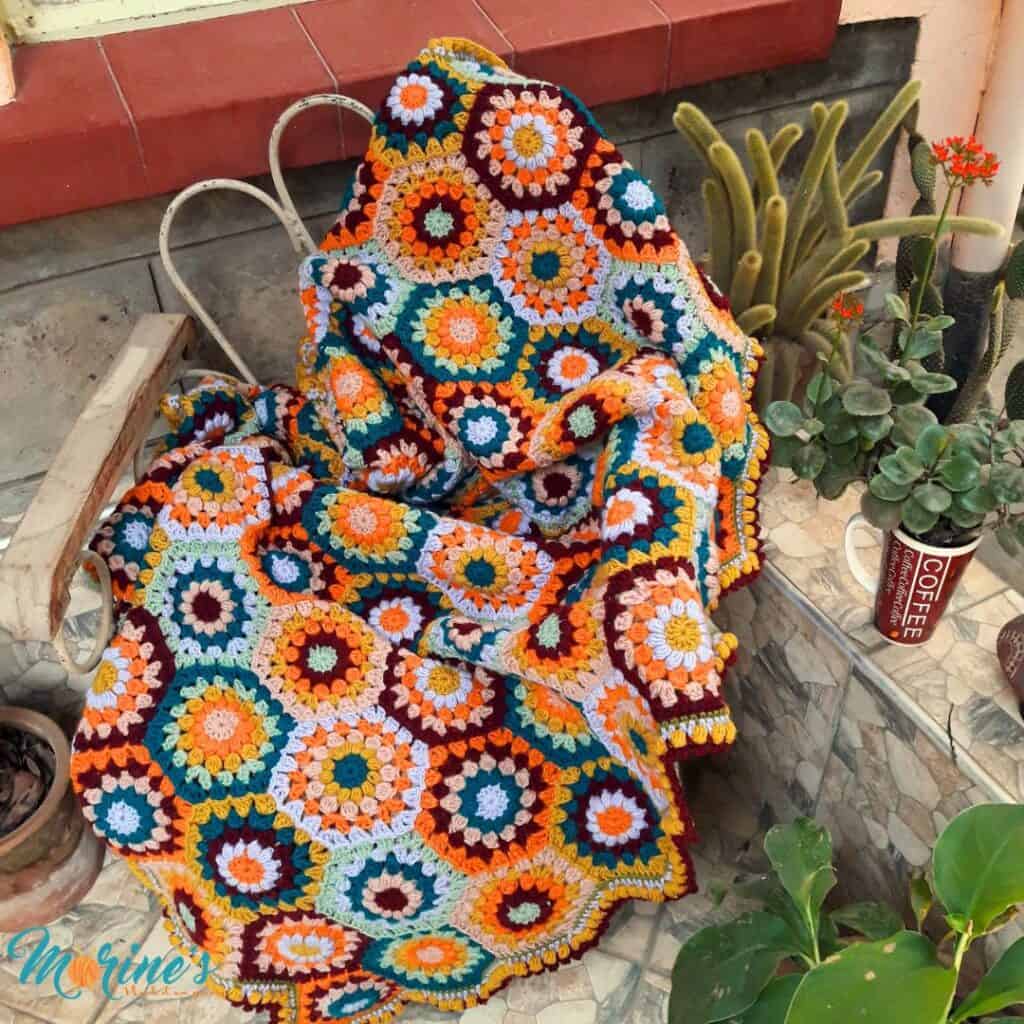 Flowers in Bloom is a lovely crochet hexagon blanket sure to comfort and brighten your world with it's unique blend of colour and texture.